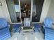 Inviting balcony with comfortable seating and a stunning view through sliding glass doors at 13415 Blue Heron Beach Dr # 1407, Orlando, FL 32821