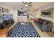Comfortable living room with modern decor and an open layout to the kitchen at 13415 Blue Heron Beach Dr # 1407, Orlando, FL 32821