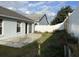 Private backyard featuring a patio and a white fence, ideal for outdoor entertaining and relaxation at 636 Birgham Pl, Lake Mary, FL 32746