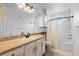 Clean bathroom boasts white cabinets, tub and shower combo, and large vanity at 6121 Metrowest Blvd # 103, Orlando, FL 32835