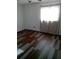 Bedroom with modern flooring, natural lighting, and a bright airy feeling at 3695 Dale Ct, Mount Dora, FL 32757