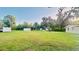 Expansive, well-manicured backyard, perfect for recreation, gardening, or peaceful relaxation at 101 Ellison Ave, New Smyrna Beach, FL 32168