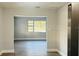 Bright living room with new flooring and natural light creating a welcoming space at 101 Ellison Ave, New Smyrna Beach, FL 32168