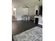 Dining room featuring dark wood floors and a table with chairs at 2822 Seymore St, Lakeland, FL 33813