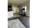 Exercise room features a treadmill, windows with blinds, and doors to other areas of the home at 2822 Seymore St, Lakeland, FL 33813