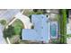 Birds eye view of single Gathering home with screened-in pool and driveway at 1776 E Cheryl Dr, Winter Park, FL 32792