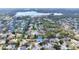 Aerial view of a beautiful home situated within a neighborhood and close to the lake at 1776 E Cheryl Dr, Winter Park, FL 32792