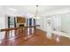 Bright living room featuring a wooden fireplace, hardwood floors, and lots of natural light at 1776 E Cheryl Dr, Winter Park, FL 32792