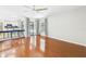 Open-concept living room showcasing hardwood floors and sliding doors to the outdoor patio at 1776 E Cheryl Dr, Winter Park, FL 32792