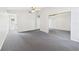 Spacious main bedroom with a mirrored closet, neutral carpet, and ensuite bathroom at 1776 E Cheryl Dr, Winter Park, FL 32792