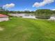 Beautiful backyard with expansive lake views and direct lake access at 318 Mitnik Dr, Deltona, FL 32738