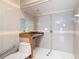 Bathroom featuring a shower, toilet, and sink with tiled walls at 318 Mitnik Dr, Deltona, FL 32738