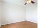 A bright, empty bedroom featuring wood-look floors and ample natural light at 318 Mitnik Dr, Deltona, FL 32738