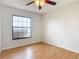 Bedroom featuring wood-look flooring and bright natural light at 318 Mitnik Dr, Deltona, FL 32738