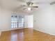 Bedroom featuring French doors leading to an outdoor space and an adjoining doorway to another room at 318 Mitnik Dr, Deltona, FL 32738