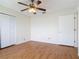 Bedroom featuring wood-look flooring and a double closet at 318 Mitnik Dr, Deltona, FL 32738