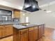 Spacious kitchen featuring a granite island and tile floors, perfect for cooking at 318 Mitnik Dr, Deltona, FL 32738