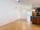 Bright and airy living space seamlessly connects to the kitchen and provides access to other areas of the home at 318 Mitnik Dr, Deltona, FL 32738