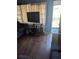 Living room featuring hardwood floors and an open door at 5195 Edwina St, Orlando, FL 32811