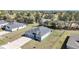 Aerial view of house showing roof, driveway, and surrounding neighborhood at 11331 Sw 54Th Cir, Ocala, FL 34476