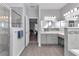 Modern bathroom with walk-in shower, double vanity, and tasteful tile accents at 11331 Sw 54Th Cir, Ocala, FL 34476
