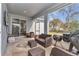 Covered patio with furniture, perfect for entertaining and grilling at 11331 Sw 54Th Cir, Ocala, FL 34476