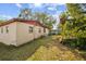 An exterior view of the backyard area of the home at 1222 Avenue M, Haines City, FL 33844