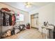 Functional bedroom with closet space, basic furnishings, and neutral tile flooring at 1222 Avenue M, Haines City, FL 33844
