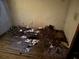 Damaged room featuring peeling wall, and exposed rotten floor, in need of repair at 1075 Merritt St, Altamonte Springs, FL 32701