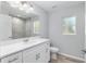 Bright bathroom with a modern vanity, new fixtures, and tiled shower, offering a clean and stylish space at 5593 Sw 199Th Ct, Dunnellon, FL 34431