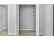 Walk-in closet features neutral paint, built-in shelving, and ample space at 5593 Sw 199Th Ct, Dunnellon, FL 34431