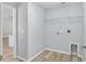 Utility room features washer and dryer hookups, with shelving for storage at 5593 Sw 199Th Ct, Dunnellon, FL 34431