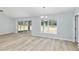 Spacious living room offers ample natural light and sliding glass doors at 5593 Sw 199Th Ct, Dunnellon, FL 34431