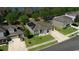 Aerial view of a single Gathering home featuring a spacious yard and solar panels on the roof at 1991 Sanderlin Point Loop, Apopka, FL 32703