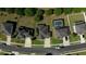 Aerial showing houses in a neighborhood, featuring solar panels, pools, well-maintained yards and streetscapes at 1991 Sanderlin Point Loop, Apopka, FL 32703