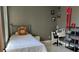 Bedroom with desk and chair as well as a bed, side table, and shelving unit at 1991 Sanderlin Point Loop, Apopka, FL 32703