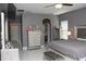 This bedroom has a ceiling fan, a window, and a nice dresser at 1991 Sanderlin Point Loop, Apopka, FL 32703