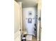 Cozy, neutral-toned bathroom featuring a toilet, towel rack, and decorative accents at 424 Luna Bella Ln # 330, New Smyrna Beach, FL 32168