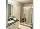 Bathroom showcasing modern vanity with granite countertop and enclosed glass shower at 424 Luna Bella Ln # 330, New Smyrna Beach, FL 32168