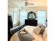 Comfortable primary bedroom featuring a leather-trimmed bed, and ample natural light at 424 Luna Bella Ln # 330, New Smyrna Beach, FL 32168
