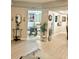 View of the open floor plan with kitchen and dining area at 424 Luna Bella Ln # 330, New Smyrna Beach, FL 32168