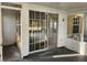 Enclosed sunroom with sliding glass doors providing access to the interior of the home at 7990 Midway Drive Ter # M103, Ocala, FL 34472