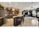 Gourmet kitchen with granite countertops, stainless steel appliances, and a spacious island at 4435 Fairway Oaks Dr, Mulberry, FL 33860
