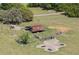 Aerial view featuring an old barn in need of repairs. Great place to start over! at 445 Se 98Th Ave, Webster, FL 33597