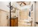 Bathroom featuring custom vanity, walk-in shower, and neutral color scheme at 445 Se 98Th Ave, Webster, FL 33597