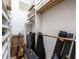 Well-organized closet space with ample shelving and clothing rods at 445 Se 98Th Ave, Webster, FL 33597