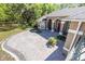 Charming home boasts manicured landscaping, a circular driveway, and an inviting front porch at 445 Se 98Th Ave, Webster, FL 33597