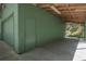 Spacious unfinished garage interior with concrete floors ready for customization at 445 Se 98Th Ave, Webster, FL 33597