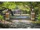 Gated entrance provides privacy with an ADT security system at 445 Se 98Th Ave, Webster, FL 33597