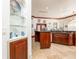 Kitchen with large central island, stainless appliances and eat-in dining area at 445 Se 98Th Ave, Webster, FL 33597